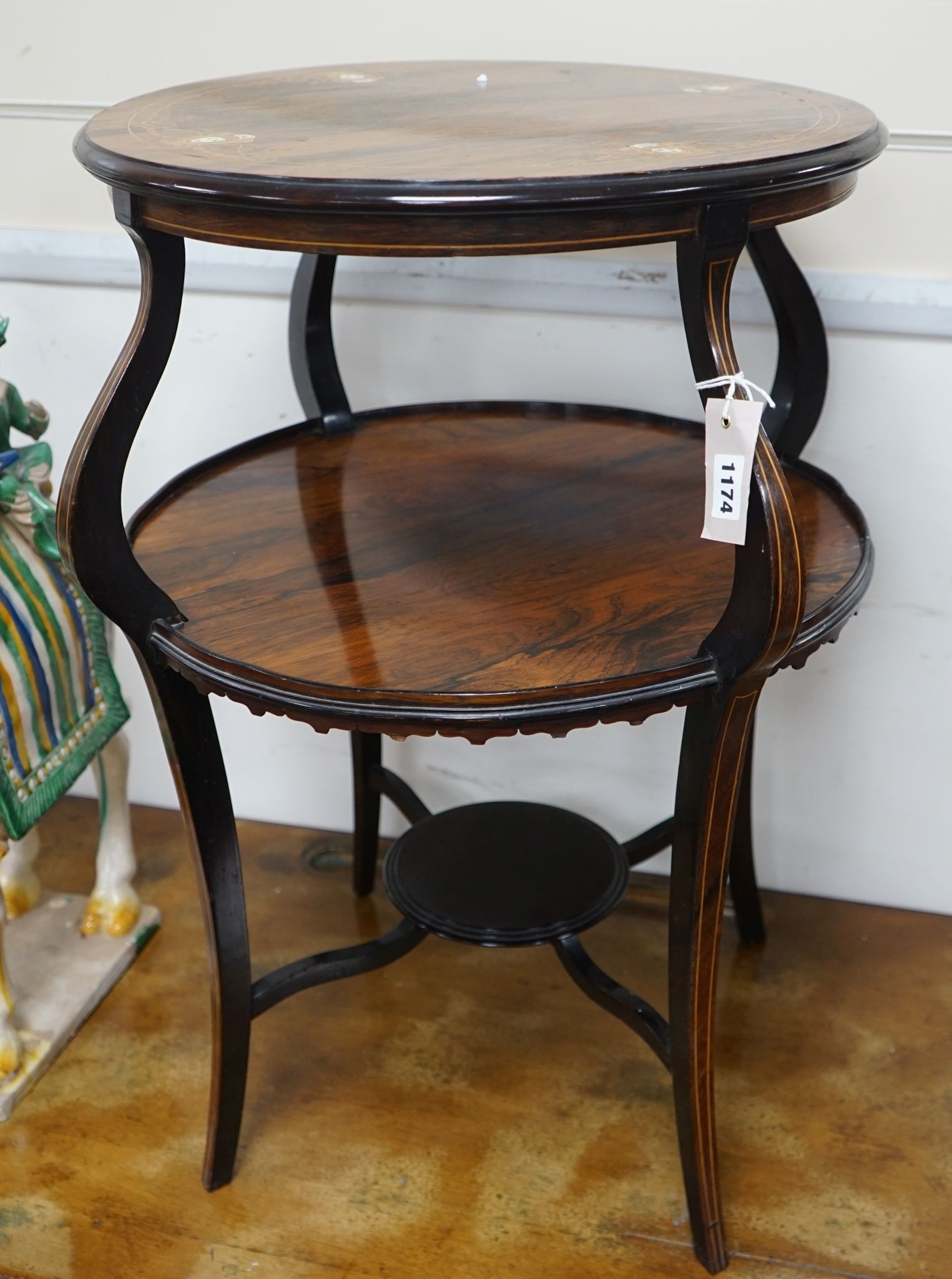 An Edwardian marquetry inlaid rosewood circular two tier centre table, diameter 47cm, height 69cm